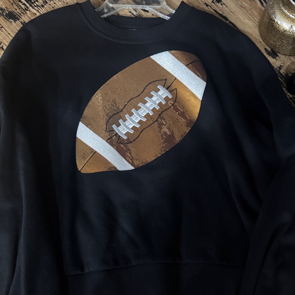 QUEEN OF SPARKLES Black Football Graphic Crewneck Sweater